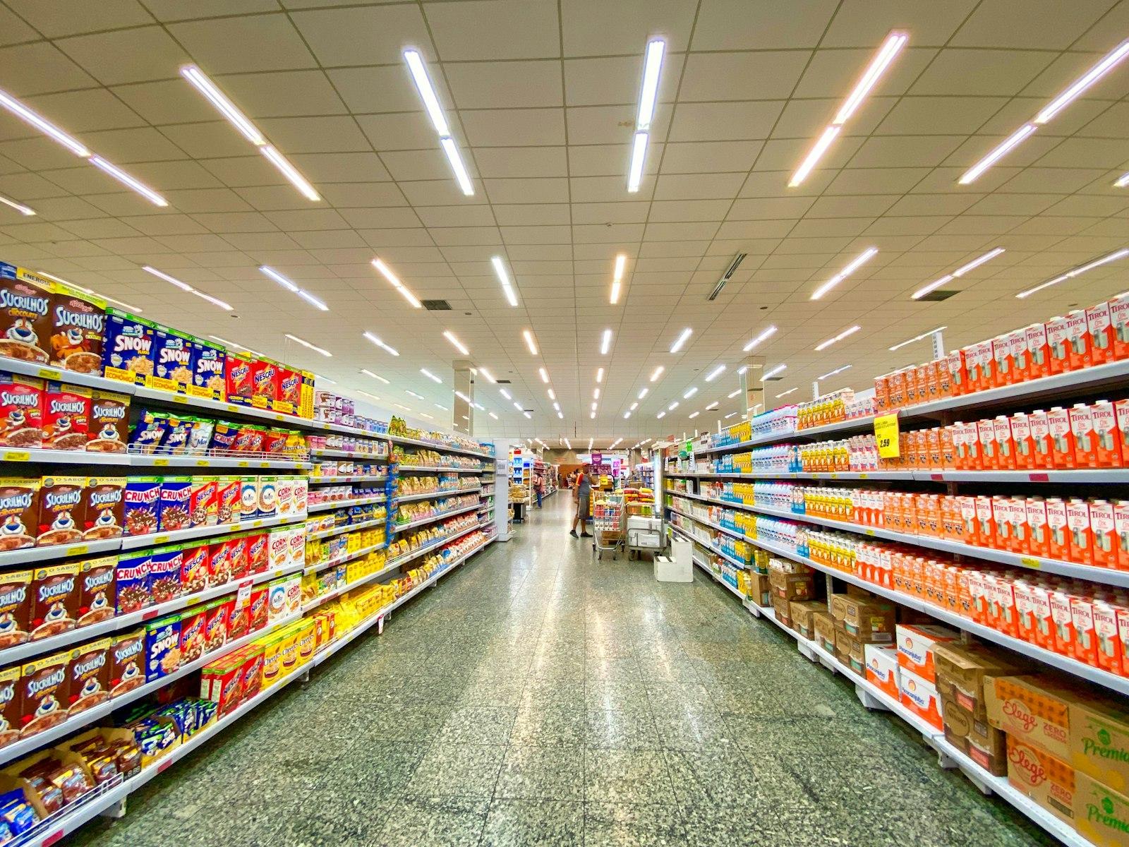 Stocked shelving inside a convenience store