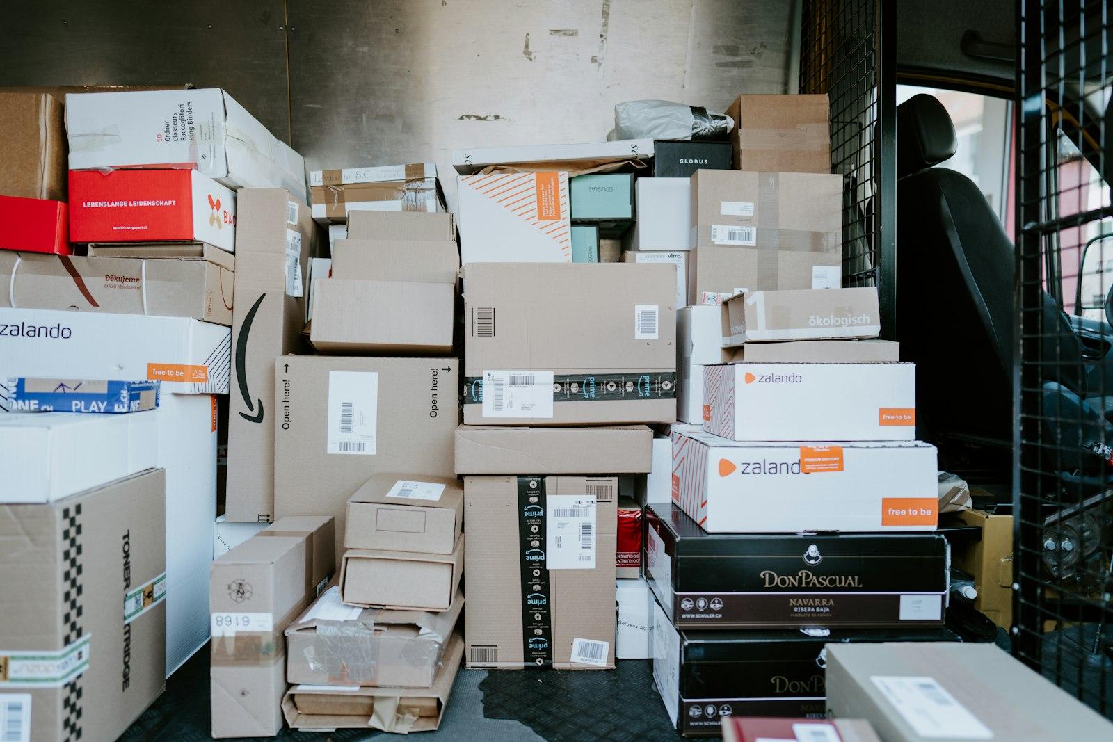 Mixed cartons and returned parcels awaiting processing in a warehouse
